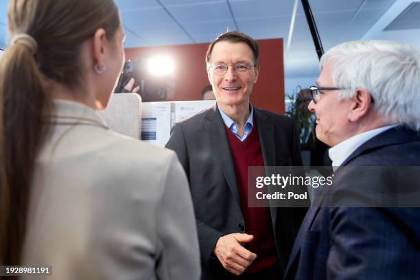 German Health Minister Karl Lauterbach speaks to Burkhard Ruppert, Chairman KV Berlin as he visits the emergency care reception of the Association of...