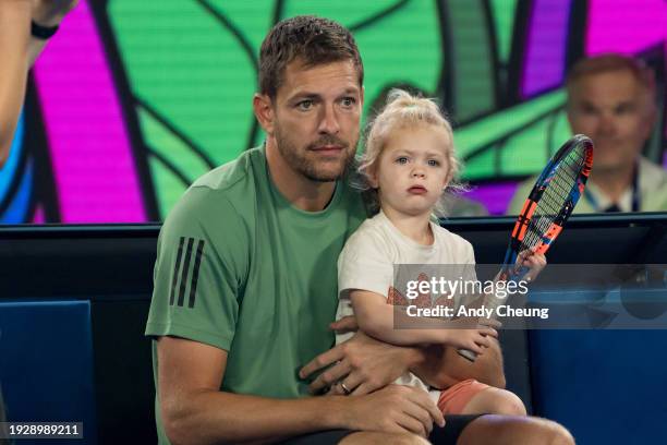 Caroline Wozniacki's husband and daughter, David Lee and Olivia Lee look on during the Kids Tennis Day Arena Spectacular ahead of the 2024 Australian...