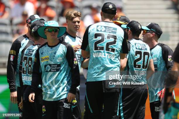 Spencer Johnson of the Heat celebrates after taking the wicket of Stephen Eskinazi of the Scorchers during the BBL match between Perth Scorchers and...