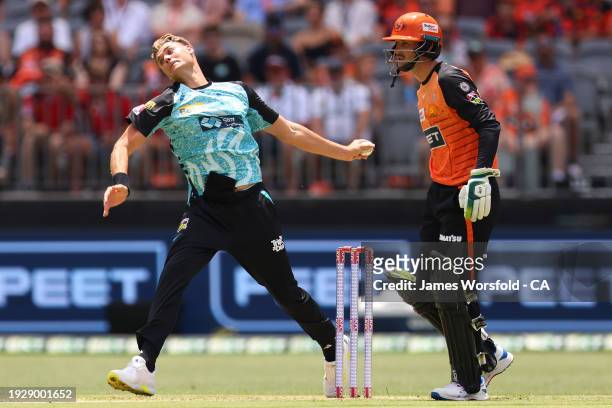 Spencer Johnson of the Heat bowling during the BBL match between Perth Scorchers and Brisbane Heat at Optus Stadium, on January 13 in Perth,...