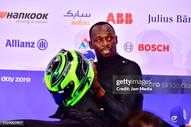 Olympic gold medalist Usain Bolt speaks in conference after driving the Formula E racing car GENBETA during the 2024 Hankook Mexico City E-Prix first...