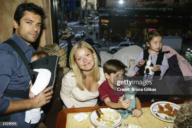 Mark Consuelos and baby Juoaquin wife Kelly Ripa, son Michael, and daughter Lola celebrate at the Opening Night Party for "A Year With Frog and Toad"...