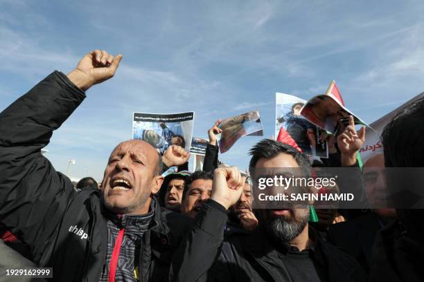 Protesters shout slogans during a demonstration outside the United Nations office, a day after several areas in the city were hit by a missile attack...