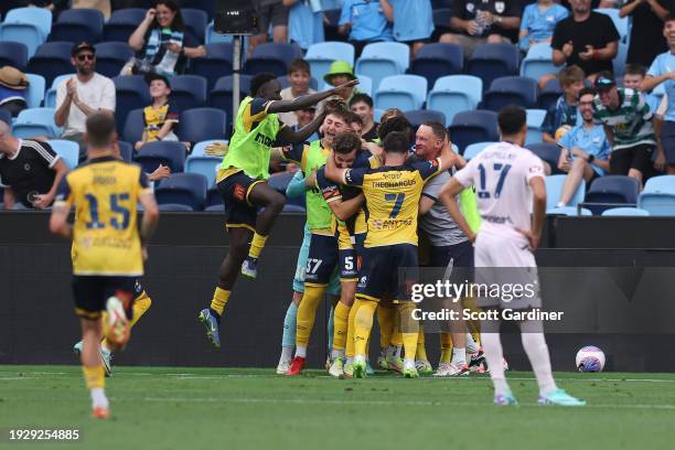 Jing Reec of the Mariners celebrates his goal with team mates during the A-League Men round 12 match between Central Coast Mariners and Melbourne...