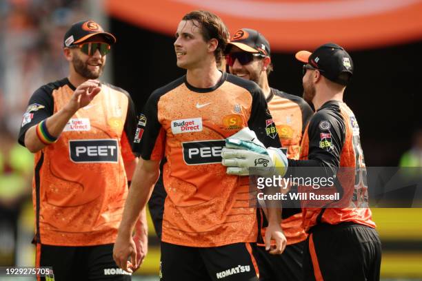 Lance Morris of the Scorchers celebrates after taking the wicket of Michael Nesser of the Heat during the BBL match between Perth Scorchers and...