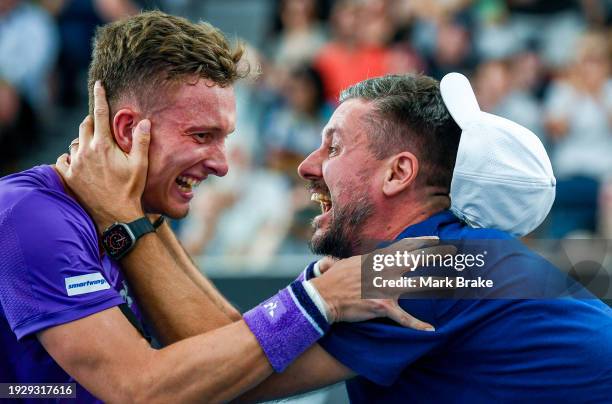 Jiri Lehecka of Czechoslovakia celebrates winning the match against Jack Draper of Great Britain with his coach Michal Navrátil in the 2024 Adelaide...