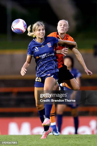 Zoe Karipidis of the Jets competes with Tameka Yallop of the Roar during the A-League Women round 12 match between Brisbane Roar and Newcastle Jets...