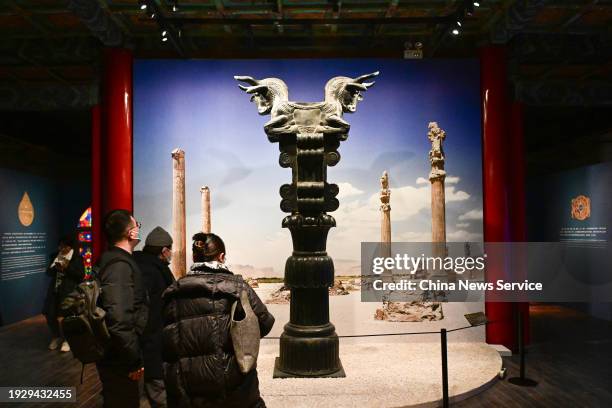 Visitors view an exhibit during the "The glory of the ancient Persia: Exhibition of Iranian cultural relics" at the Palace Museum on January 10, 2024...