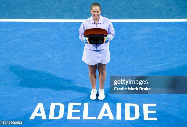 Jelena Ostapenko of Latvia poses with the Womens Singles Champion trophy after her match against Daria Kasatkina in the 2024 Adelaide International...