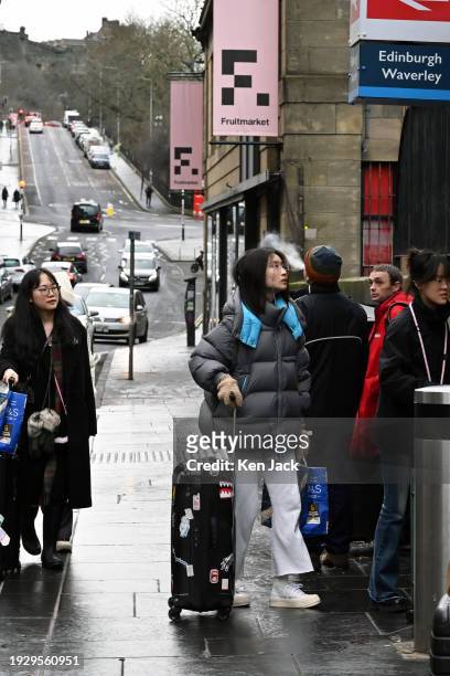 Tourists outside Waverley Station, as the Scottish Parliament prepares to debate the Visitor Levy Bill at Stage 1, on January 16, 2024 in Edinburgh,...