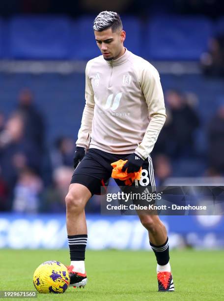 Andreas Pereira of Fulham FC warms up ahead of the Premier League match between Chelsea FC and Fulham FC at Stamford Bridge on January 13, 2024 in...