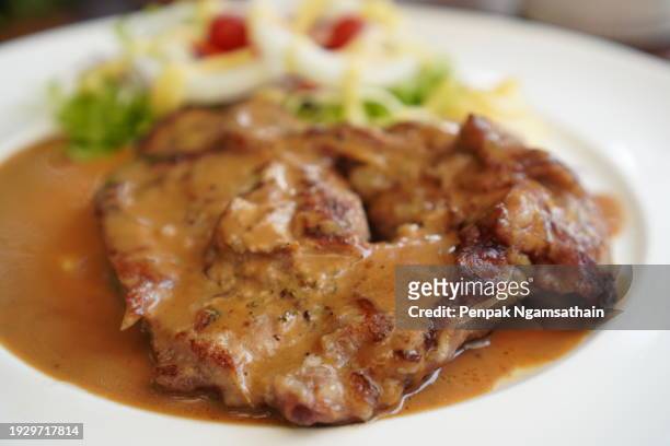 pork shoulder steak and vegetable salad - pork shoulder stock pictures, royalty-free photos & images