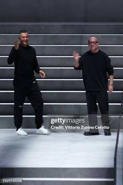 Fashion designers Stefano Gabbana and Domenico Dolce walk the runway at the Dolce & Gabbana fashion show during the Milan Menswear Fall/Winter...