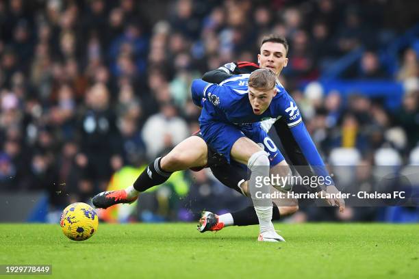 Cole Palmer of Chelsea is tackled by Joao Palhinha of Fulham during the Premier League match between Chelsea FC and Fulham FC at Stamford Bridge on...