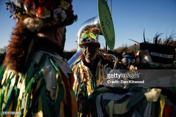 Morris dancers and other performers prepare for the Whittlesey Straw Bear festival on January 13, 2024 in Whittlesey, United Kingdom. The Whittlesey...