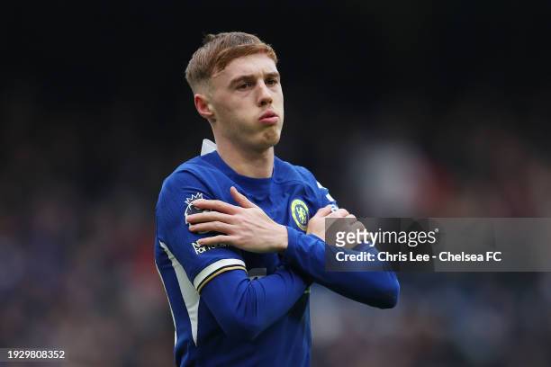 Cole Palmer of Chelsea celebrates after scoring their sides first goal from the penalty spot during the Premier League match between Chelsea FC and...