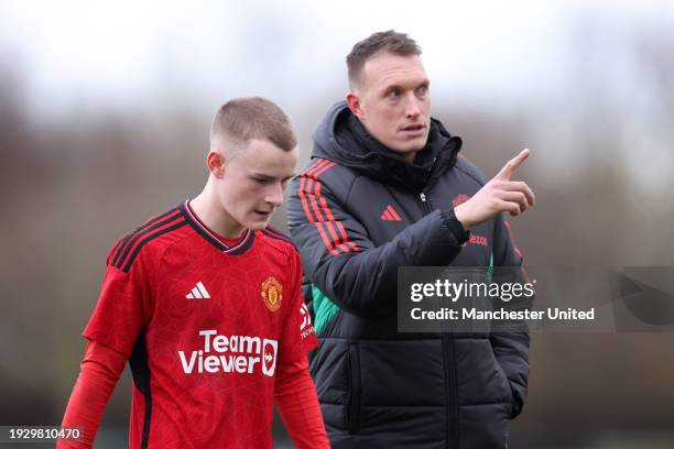 Phil Jones, Coach of Manchester United U18 speaks with Ashton Missin of Manchester United U18 during the U18 Premier League match between Newcastle...