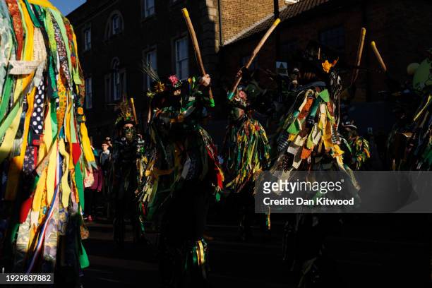Morris dancers perform during the Whittlesea Straw Bear festival on January 13, 2024 in Whittlesey, United Kingdom. The Whittlesea Straw Bear is an...