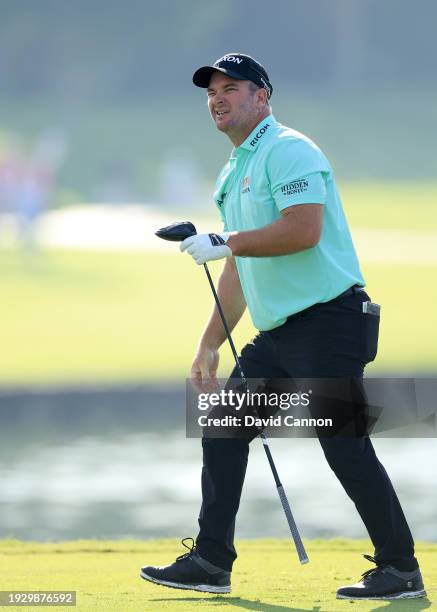 Ryan Fox of New Zealand plays his tee shot on the third hole on Day Three of the Dubai Invitational at Dubai Creek Golf and Yacht Club on January 13,...