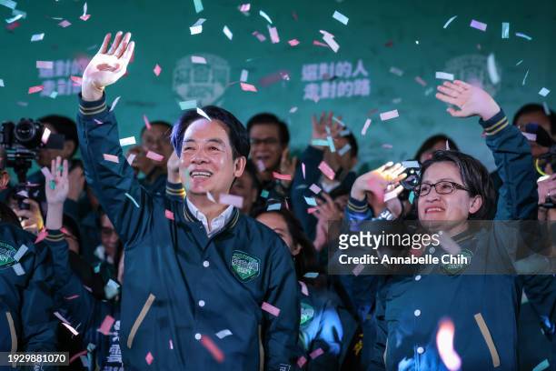 Confetti flies over the stage and crowd as Taiwan's Vice President and presidential-elect from the Democratic Progressive Party Lai Ching-te and his...