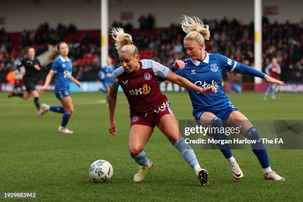 Noelle Maritz of Aston Villa is challenged by Sara Holmgaard of Everton during the Adobe Women's FA Cup Fourth Round match between Aston Villa and...