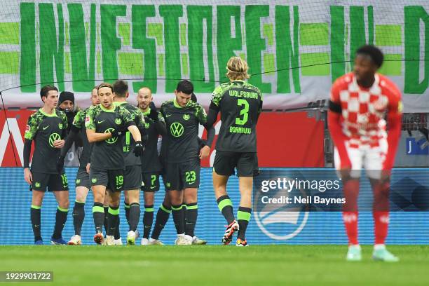 Vaclav Cerny of VfL Wolfsburg celebrates with team mates after scoring their sides first goal during the Bundesliga match between 1. FSV Mainz 05 and...