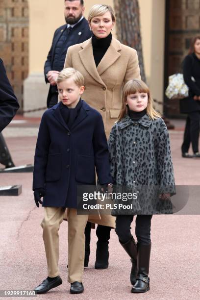 Prince Jacques of Monaco, Charlene, Princess of Monaco and Princess Gabriella of Monaco attend The Circus Parade on January 13, 2024 in Monaco,...