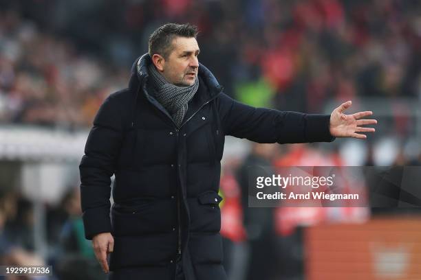 Nenad Bjelica, Head Coach of 1.FC Union Berlin, gestures during the Bundesliga match between Sport-Club Freiburg and 1. FC Union Berlin at...