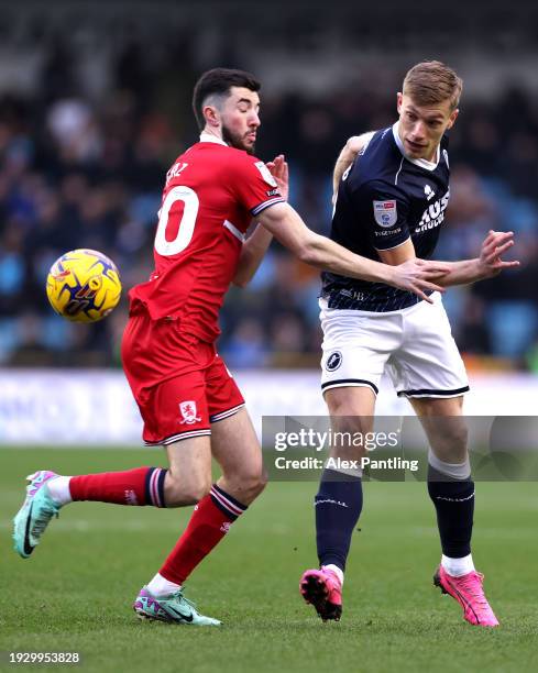 Zian Flemming of Millwall and Finn Azaz of Middlesborough during the Sky Bet Championship match between Millwall and Middlesbrough at The Den on...