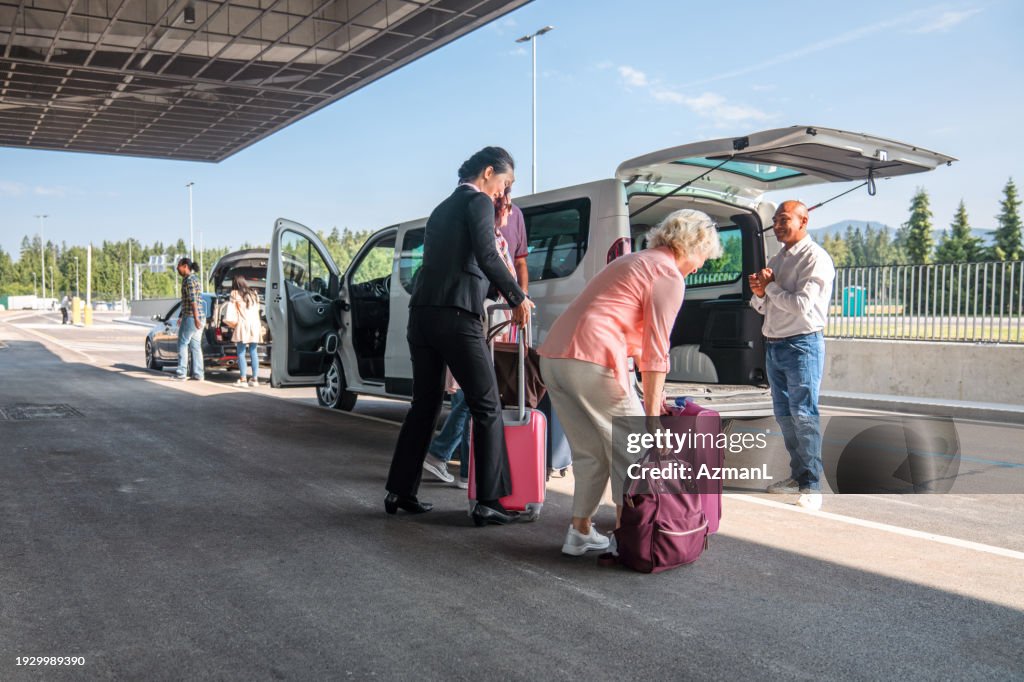 Mid Adult Hispanic Airport Shuttle Driver Wishing A Safe Trip To His ...