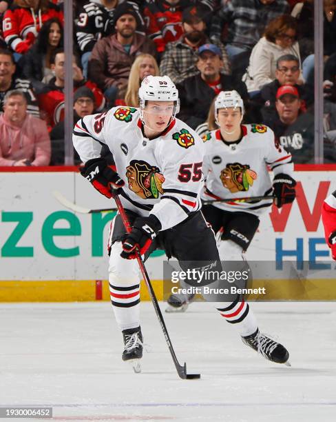 Kevin Korchinski of the Chicago Blackhawks skates against the New Jersey Devils at Prudential Center on January 05, 2024 in Newark, New Jersey.