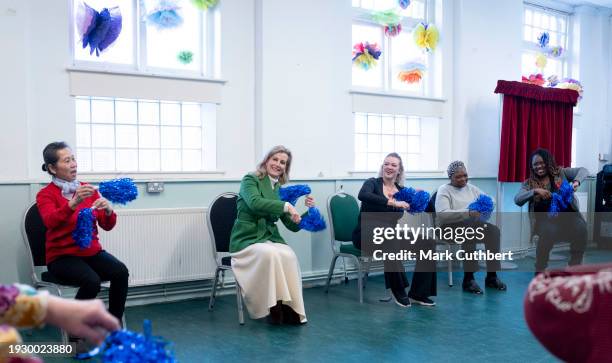 Sophie, Duchess of Edinburgh takes part in seated dancing during a visit to the Katherine Low Settlement on January 16, 2024 in London, England....