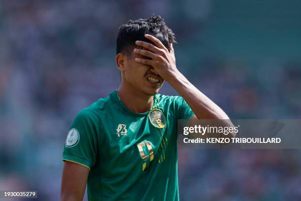 Mauritania's forward Hemeya Tanji reacts during the Africa Cup of Nations 2024 group D football match between Burkina Faso and Mauritania at Stade de...