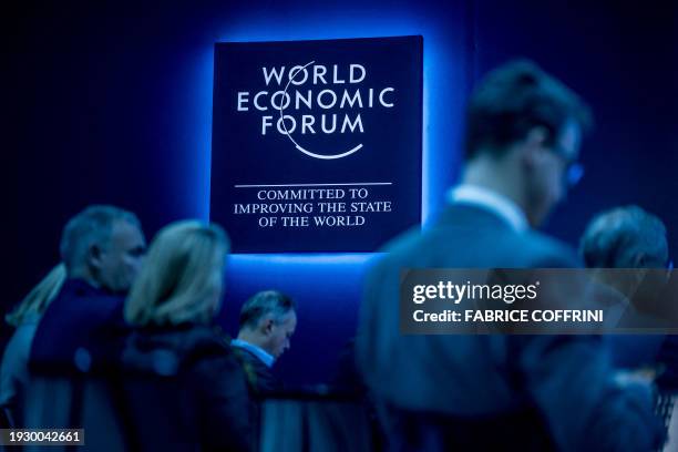 Participants wait for a session at the World Economic Forum annual meeting in Davos, on January 16, 2024.