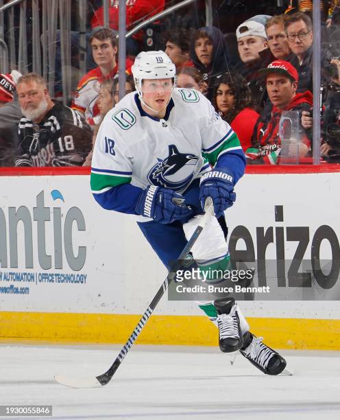 Sam Lafferty of the Vancouver Canucks skates against the New Jersey Devils at Prudential Center on January 06, 2024 in Newark, New Jersey.