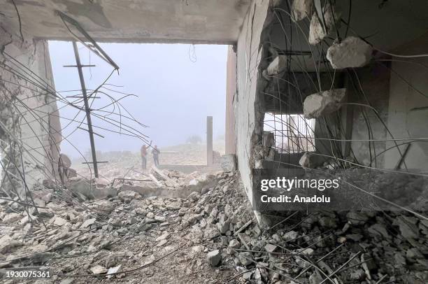 View of a collapsed building after the attacks at the town of Teltite in Idlib, Syria on January 16, 2024. According to the Iranian Revolutionary...