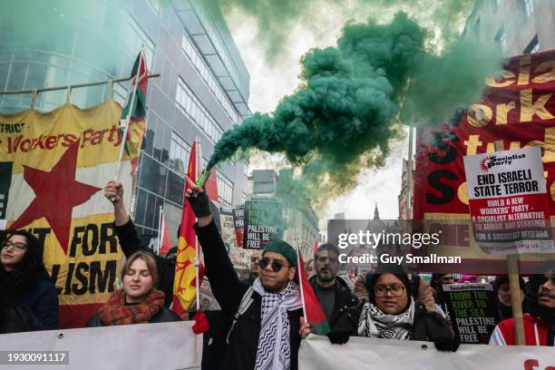 The Socialist Workers Party contingent are seen as hundreds of thousands of people join the protest in London on January 13, 2024 in London, England....