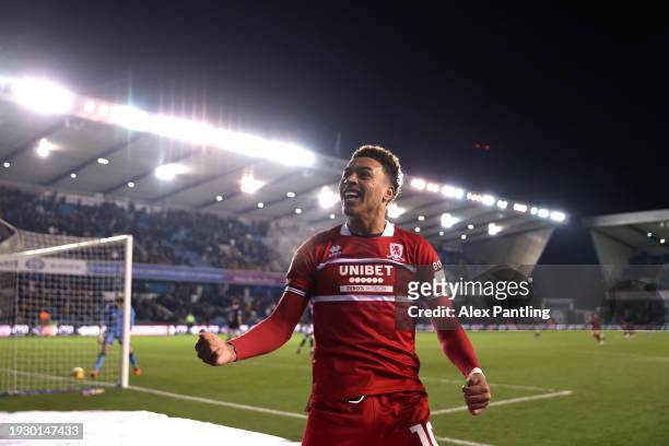 Morgan Rogers of Middlesborough celebrates his sides third goal during the Sky Bet Championship match between Millwall and Middlesbrough at The Den...