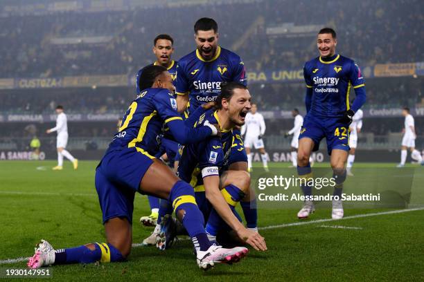 Milan Djuric of Hellas Verona FC celebrates scoring his team's first goal with teammates during the Serie A TIM match between Hellas Verona FC and...