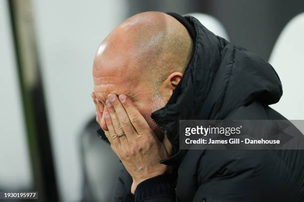 Josep 'Pep' Guardiola, manager of Manchester City, looks dejected during the Premier League match between Newcastle United and Manchester City at St....