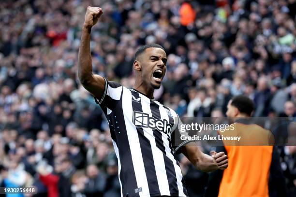 Alexander Isak of Newcastle United celebrates scoring his team's first goal during the Premier League match between Newcastle United and Manchester...