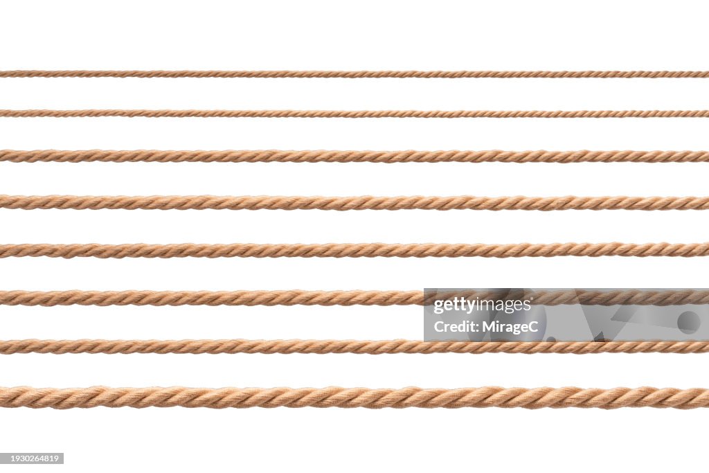 A Set of Straight Brown Ropes From Thin to Thick Isolated on White