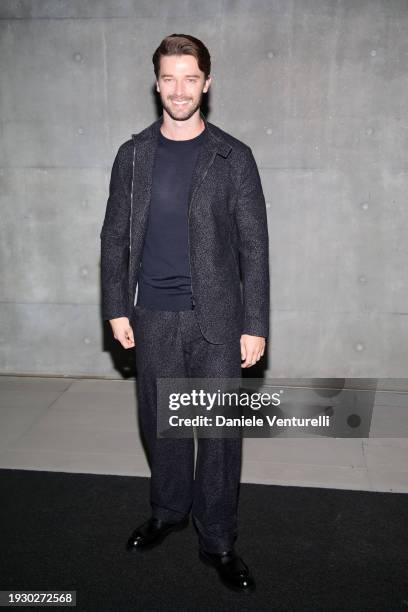 Patrick Schwarzenegger arrives at the Emporio Armani fashion show during the Milan Menswear Fall/Winter 2024-2025 on January 13, 2024 in Milan, Italy.