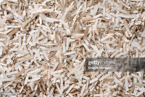 shredded brown paper for recycle - brown shredded paper stock pictures, royalty-free photos & images
