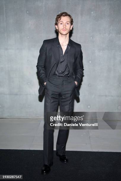 Harry Lawtey arrives at the Emporio Armani fashion show during the Milan Menswear Fall/Winter 2024-2025 on January 13, 2024 in Milan, Italy.