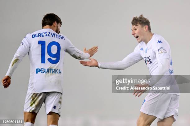 Daniel Maldini of Empoli FC celebrates scoring his team's first goal with teammate Bartosz Bereszynski of Empoli FC during the Serie A TIM match...