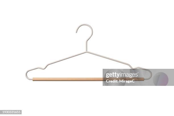 white coat hanger isolated on white - coathanger stock pictures, royalty-free photos & images