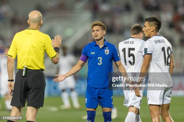 Theerathon Bunmathan of Thailand disputes his yellow card during the...  News Photo - Getty Images