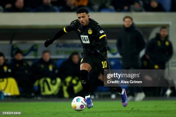 Jadon Sancho of Borussia Dortmund runs with the ball during the Bundesliga match between SV Darmstadt 98 and Borussia Dortmund at Merck-Stadion am...