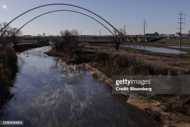 Steam rises from the Trinity River following a storm in Dallas, Texas, US, on Tuesday, Jan. 16, 2024. A bitter cold from a winter storm is gripping...